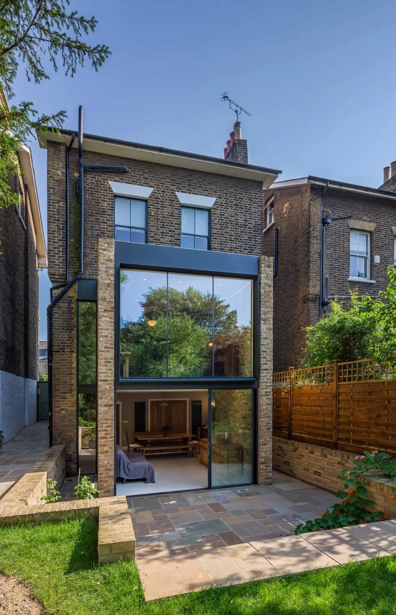 This image depicts the view from the garden to the house of the Handen Road project.